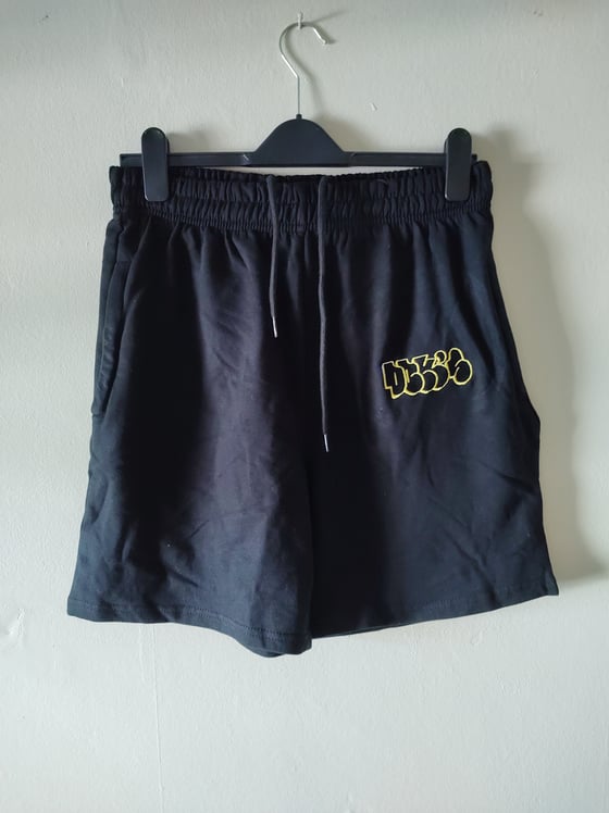 Image of DBK'S embroidered throw up logo shorts