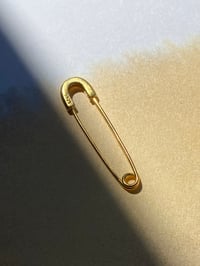 Image 1 of SAFETY  PIN  PIERCE --