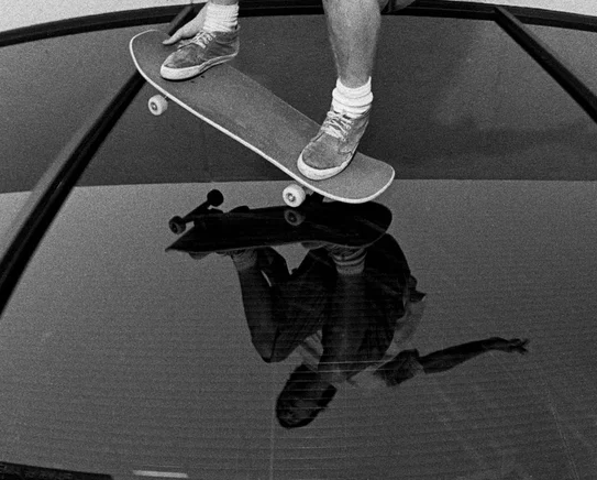 John Cardiel, Glass ride, Bakersfield CA 1992, Spitfire Wheels ad, by Tobin Yelland