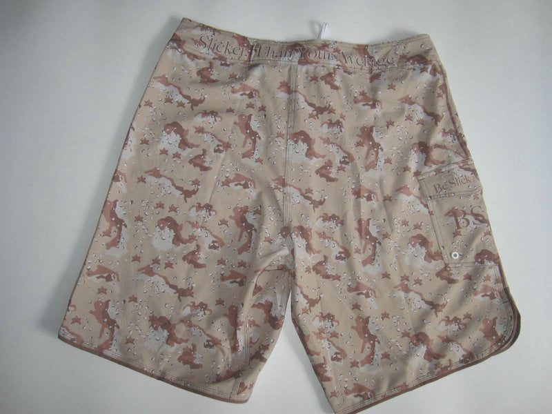 Image of Slicksymbol logo brown camo boardshorts