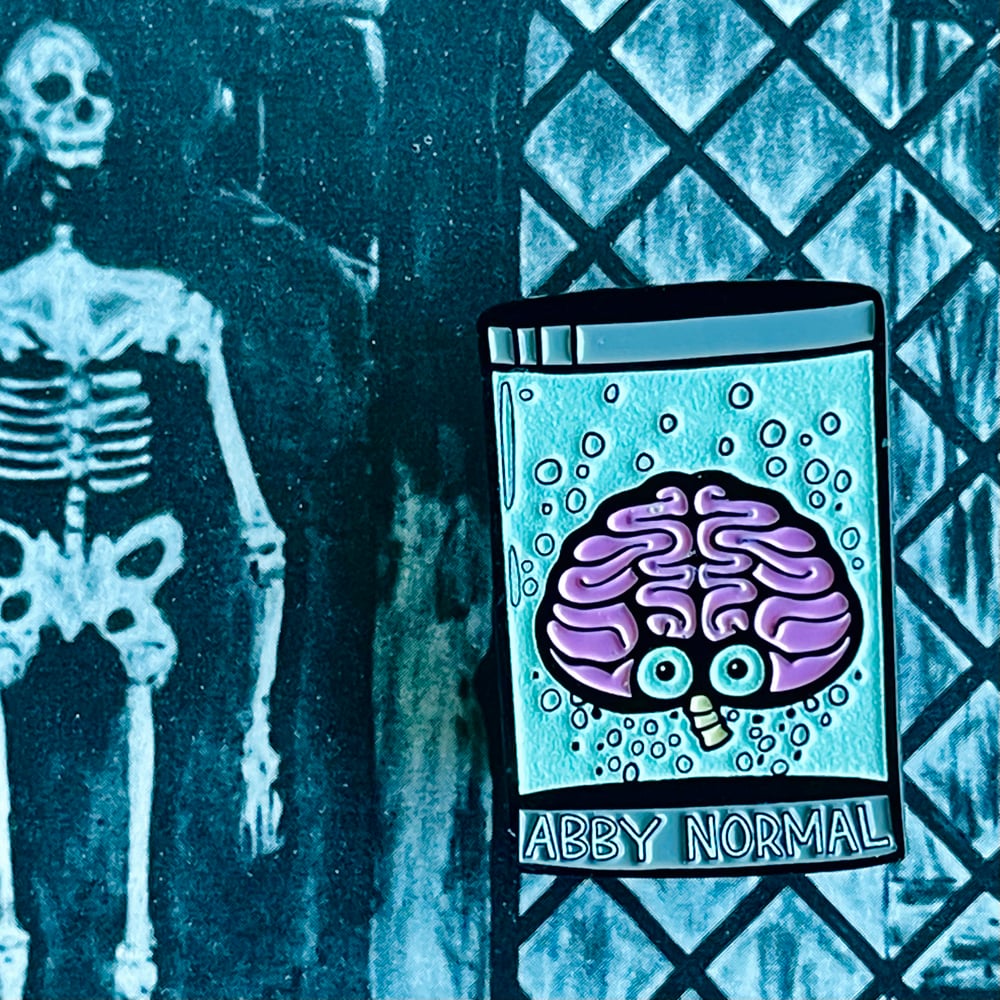 ABBY NORMAL 1.5” Glow-in-the-Dark Brain Soft Enamel Pin