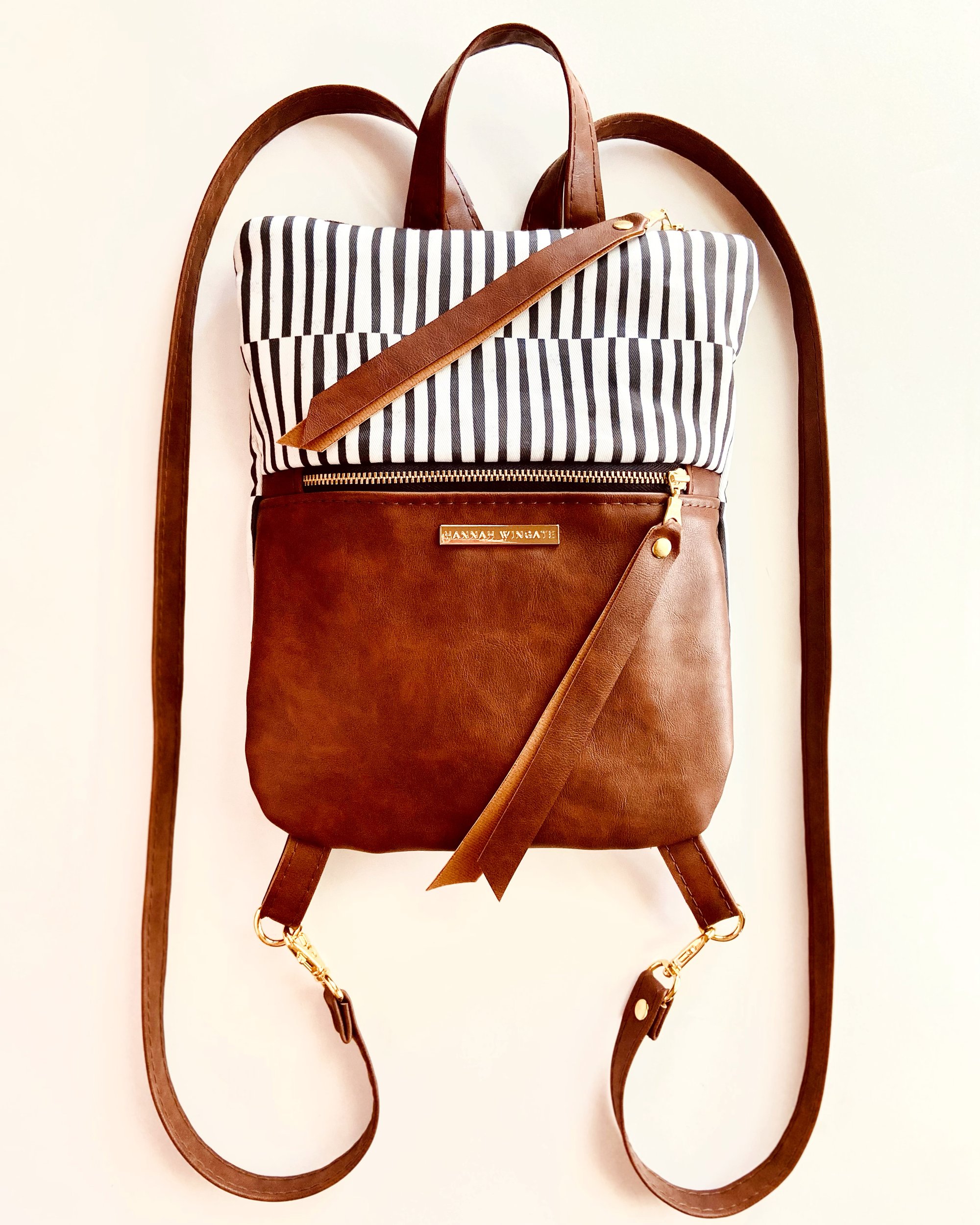 brandy melville leather flap backpack Shoulder Bag it is the only backpack youll need to keep your hands free on your adventureswhether youre traveling to the office or to the markets in Marrakesh Brandy melville dark brown faux
