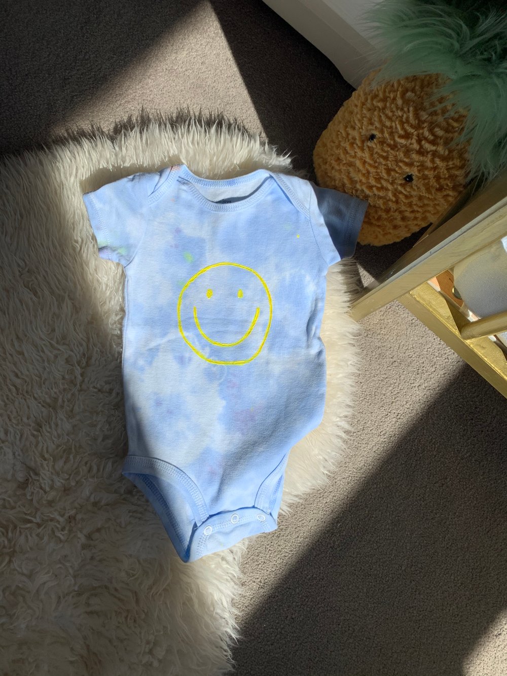 Image of Happy Face Baby Grow in Pale Blue tie dye 
