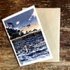 The lure of the sea greetings card