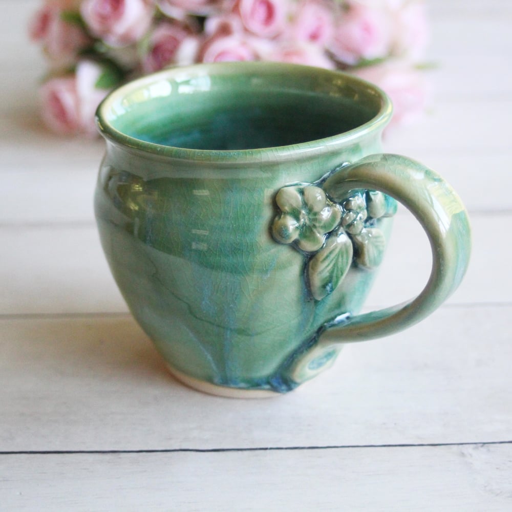 Image of Shimmering Green Pottery Mug with Floral Details, Coffee Cup 14 oz., Made in USA