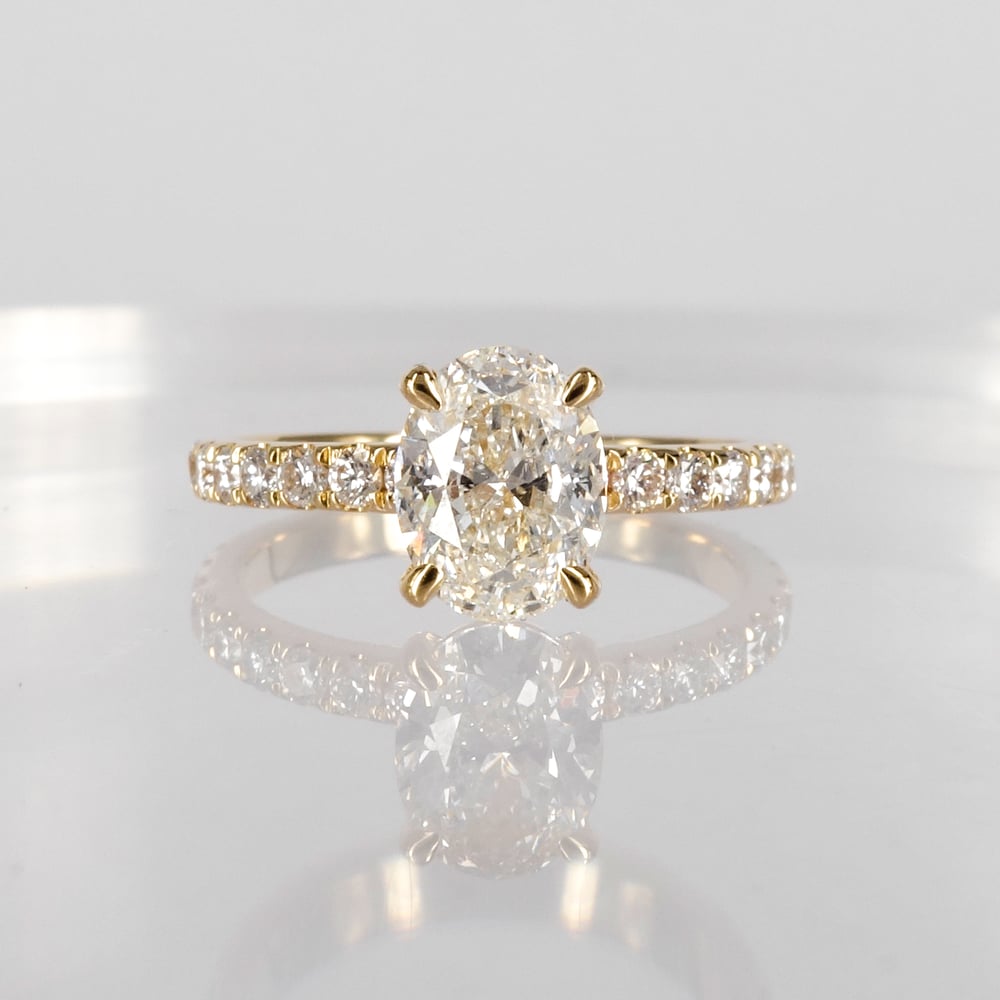 Image of 18ct yellow gold oval diamond solitaire engagement ring. pj5812