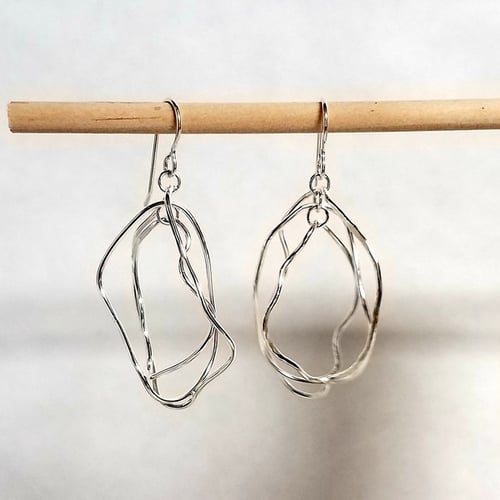 Image of Misbehaving links in sterling silver and 14kt gf