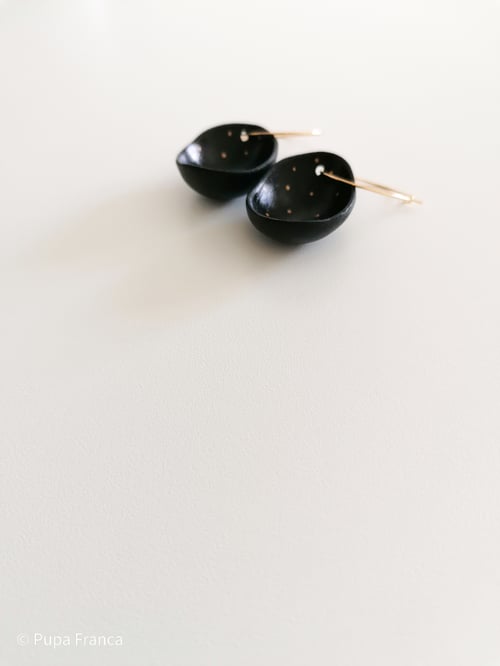 Image of Eggshell Earrings in Black with Golden Dots 