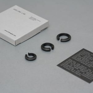 Image of DRILLING LAB - Framework Ear Cuff (Raw Black)
