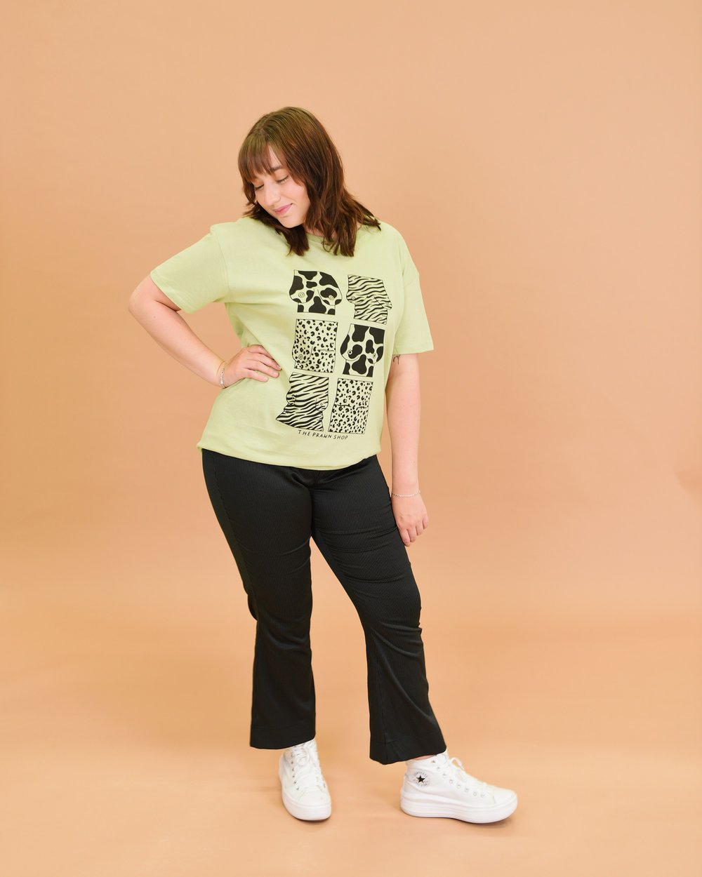 Image of the three by three tee
