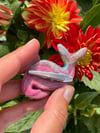 pink swirling strawberry cat-hair clip 