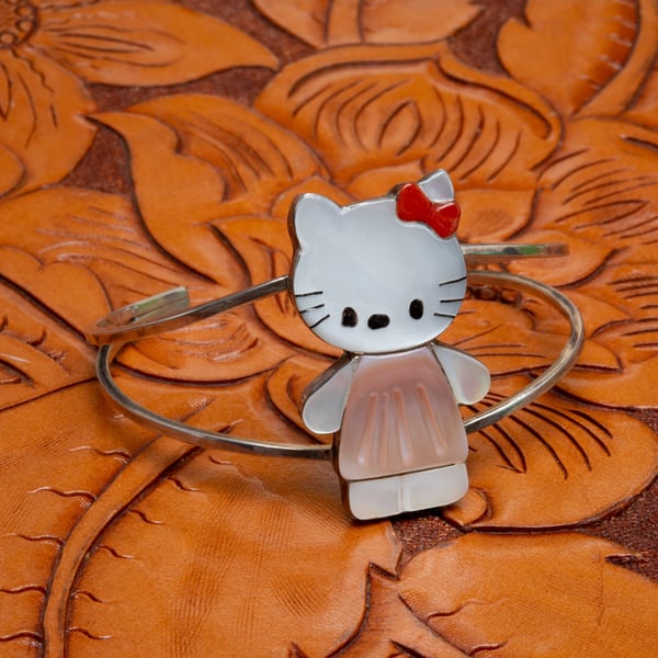 Image of Zuni Mother Of Pearl Chanel Inlay Sterling Silver Hello Kitty Bracelet size small