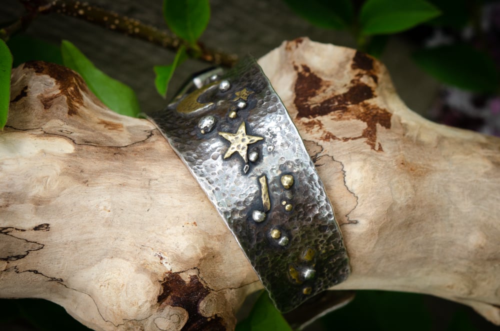 Image of amethyst sun, moon, and stars bracelet