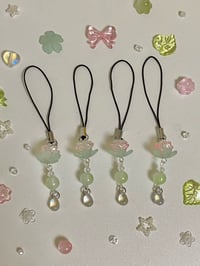 Image 1 of lotus phonecharm