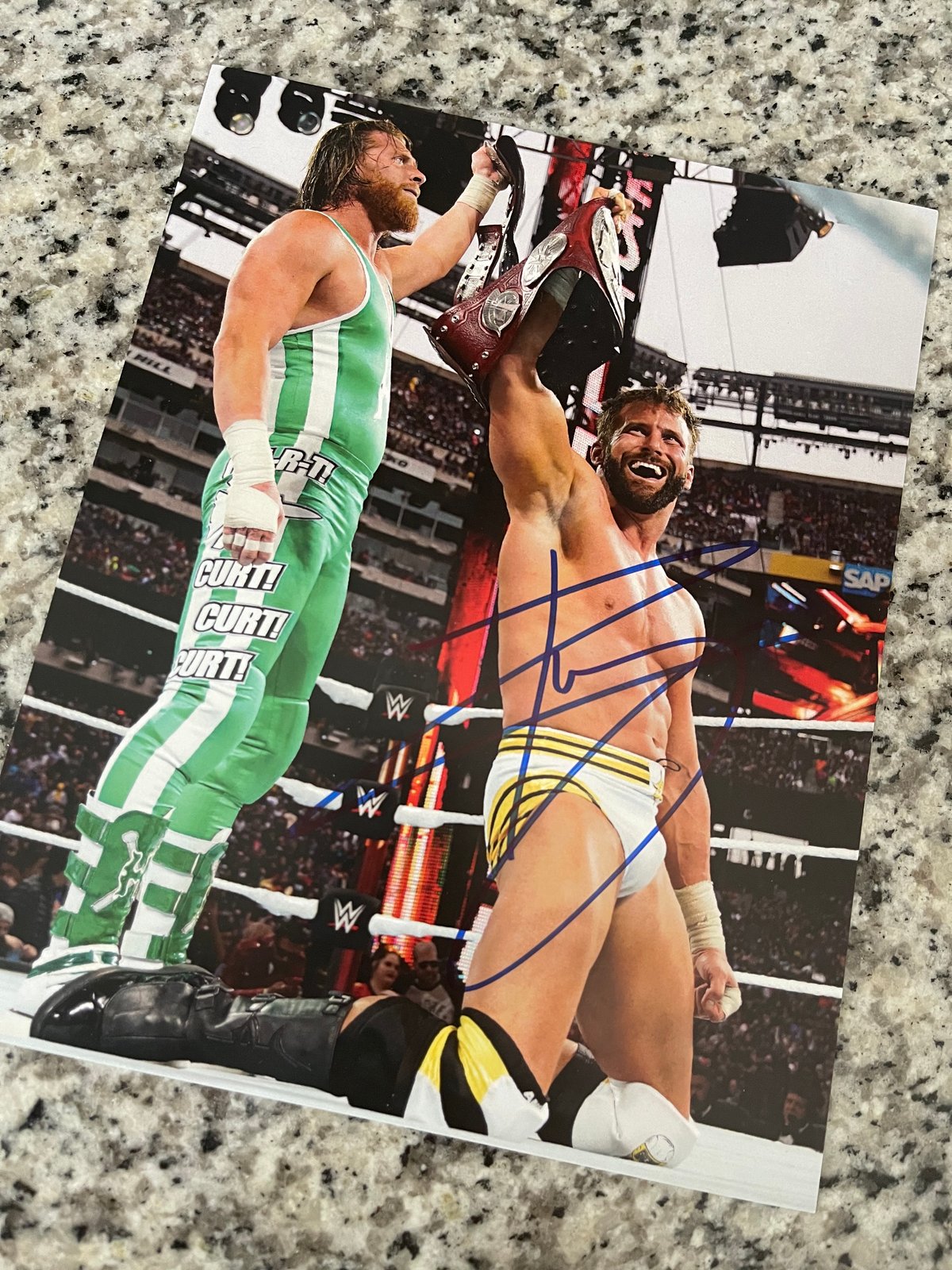 TAG TITLES AUTOGRAPHED 8x10