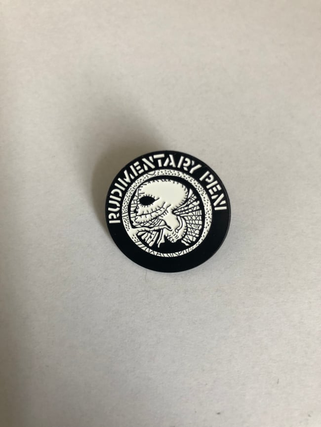 Rudimentary Peni Enamel Pin Badge