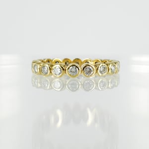 Image of 9ct yellow gold full circle diamond set eternity ring.  Pj0670