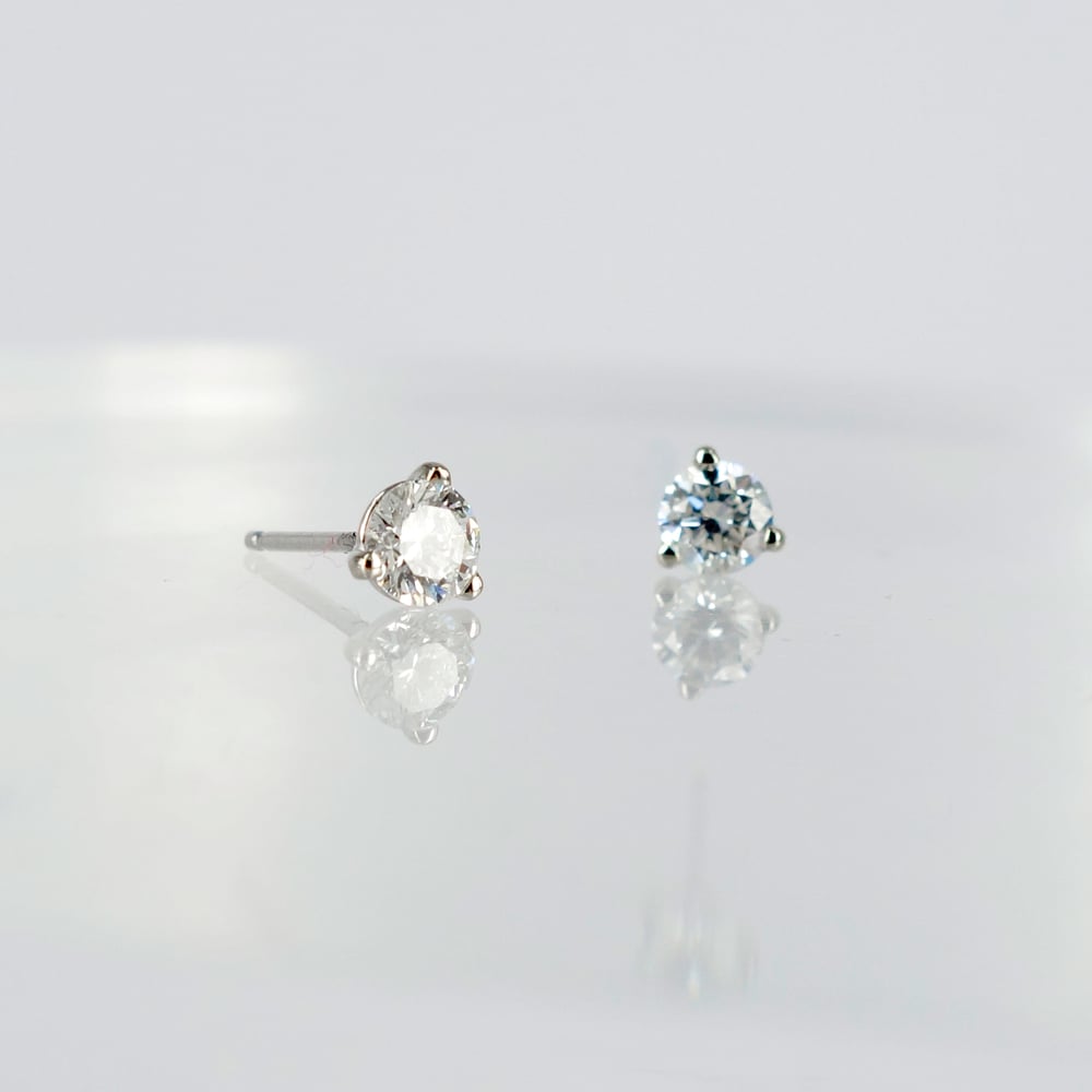 Image of 14ct white gold diamond studs.Set with  2 Diamonds  = .50ct FSI2 total weight. Pj5863