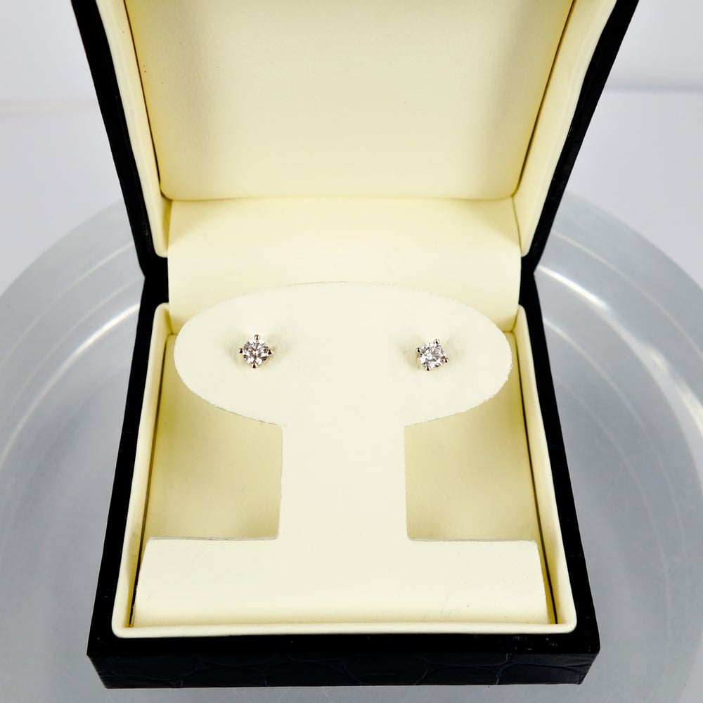 Image of 14ct white gold diamond studs set with 2 = .60ct FSI2. PJ5857