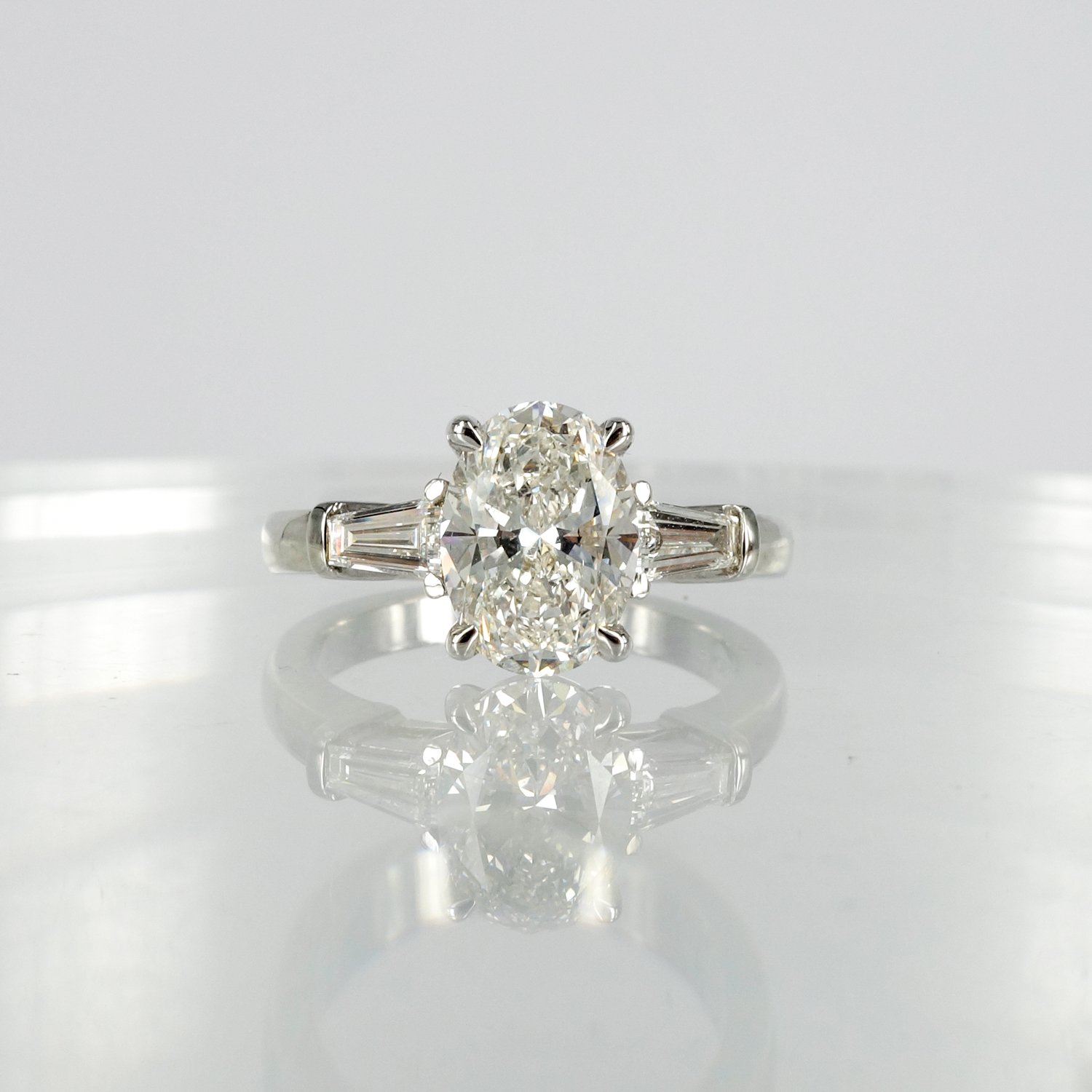 oval and baguette diamond ring