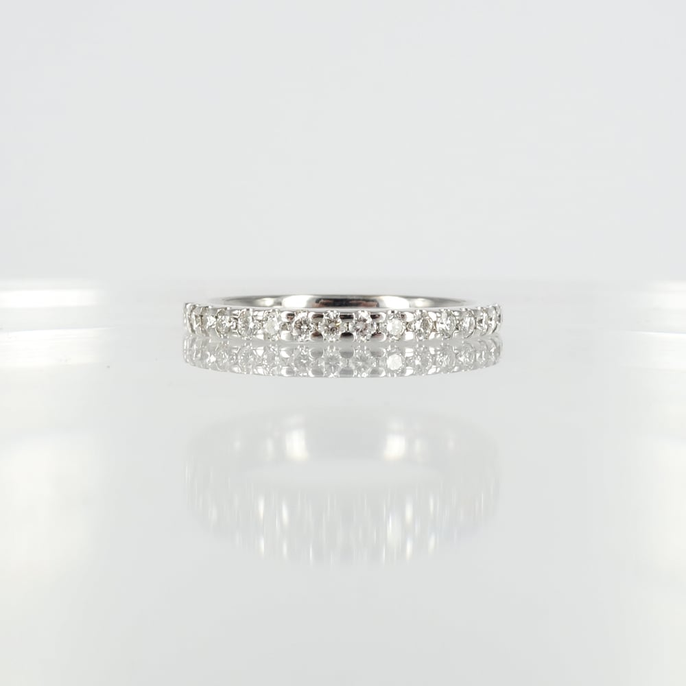 Image of 18ct white gold diamond set wedding band. pj5872