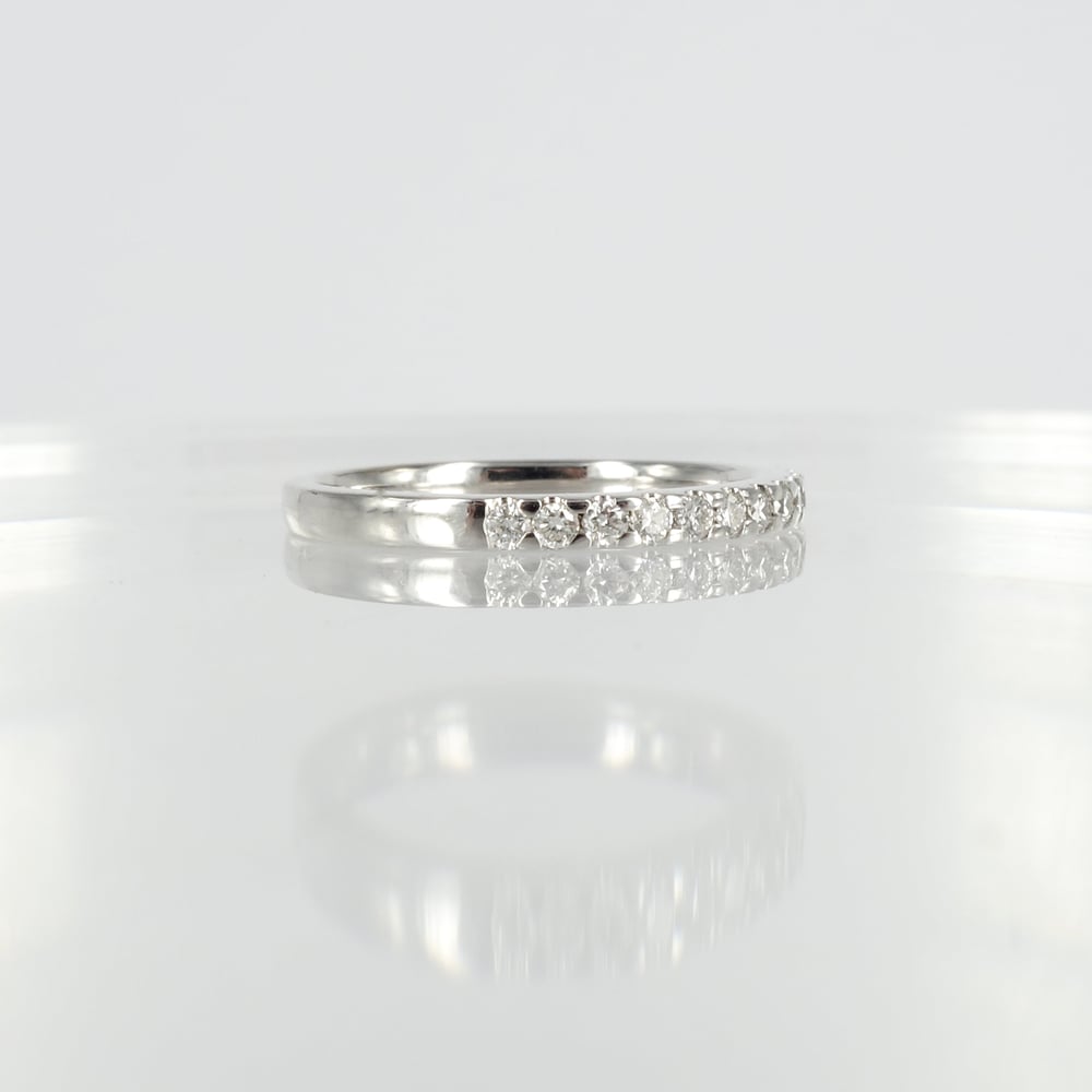 Image of 18ct white gold diamond set wedding band. pj5872