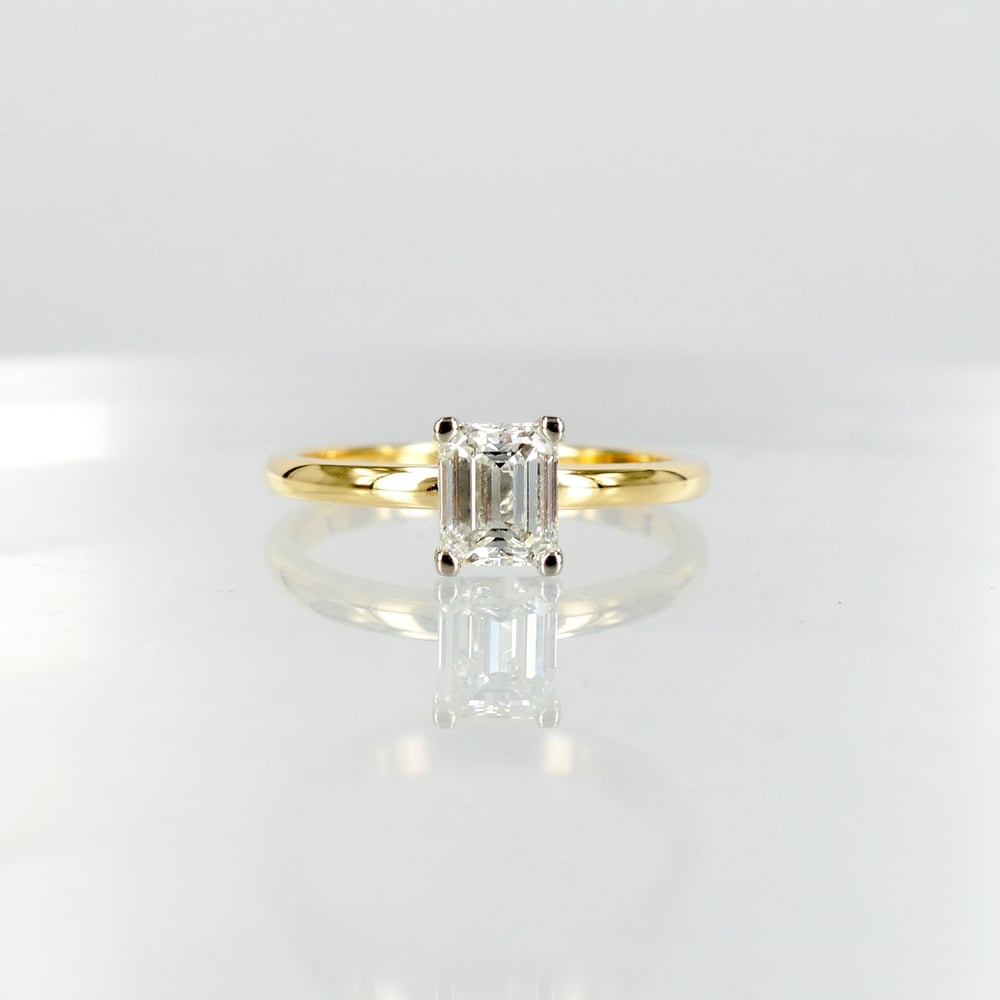 Image of 18ct yellow gold 1ct Asscher cut diamond solitaire ring.