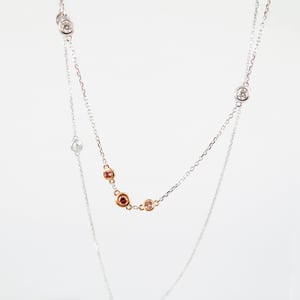 Image of Pink and white diamond 18ct gold necklet. NL11