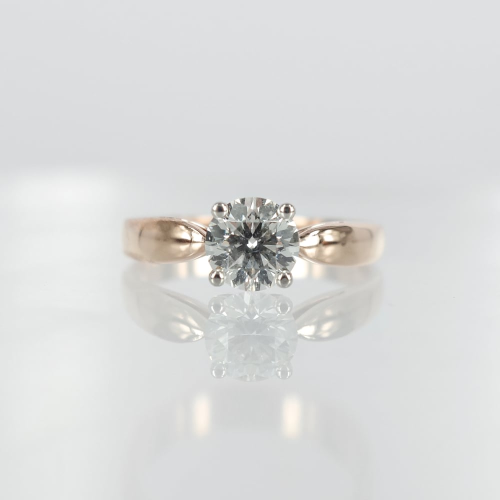 Image of 18ct rose gold solitaire diamond ring.