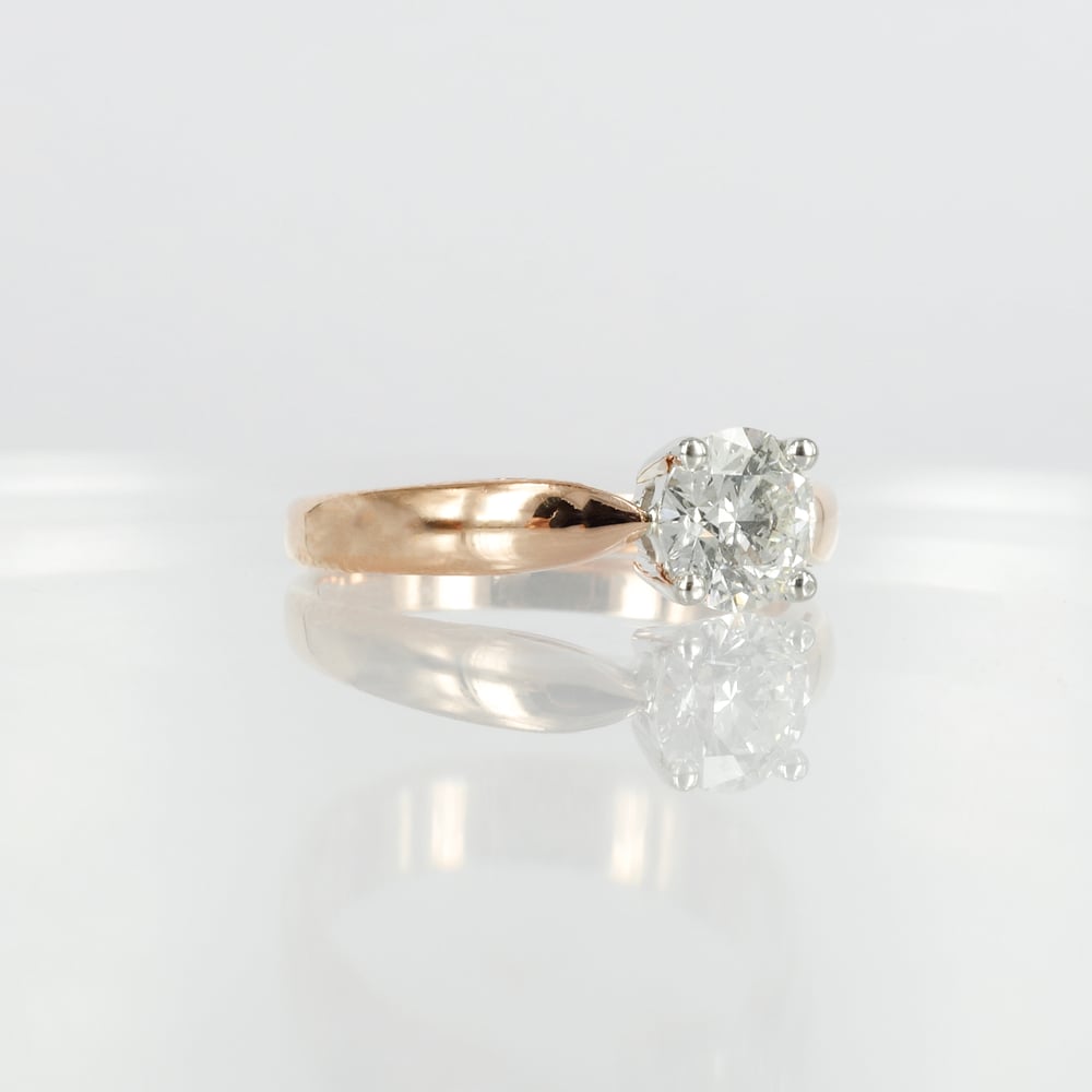 Image of 18ct rose gold solitaire diamond ring.