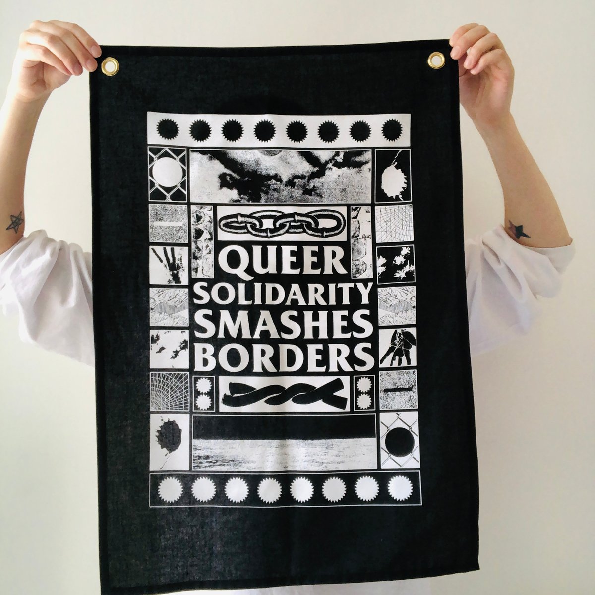 Image of Queer Solidarity Smashes Borders fabric wall hanging