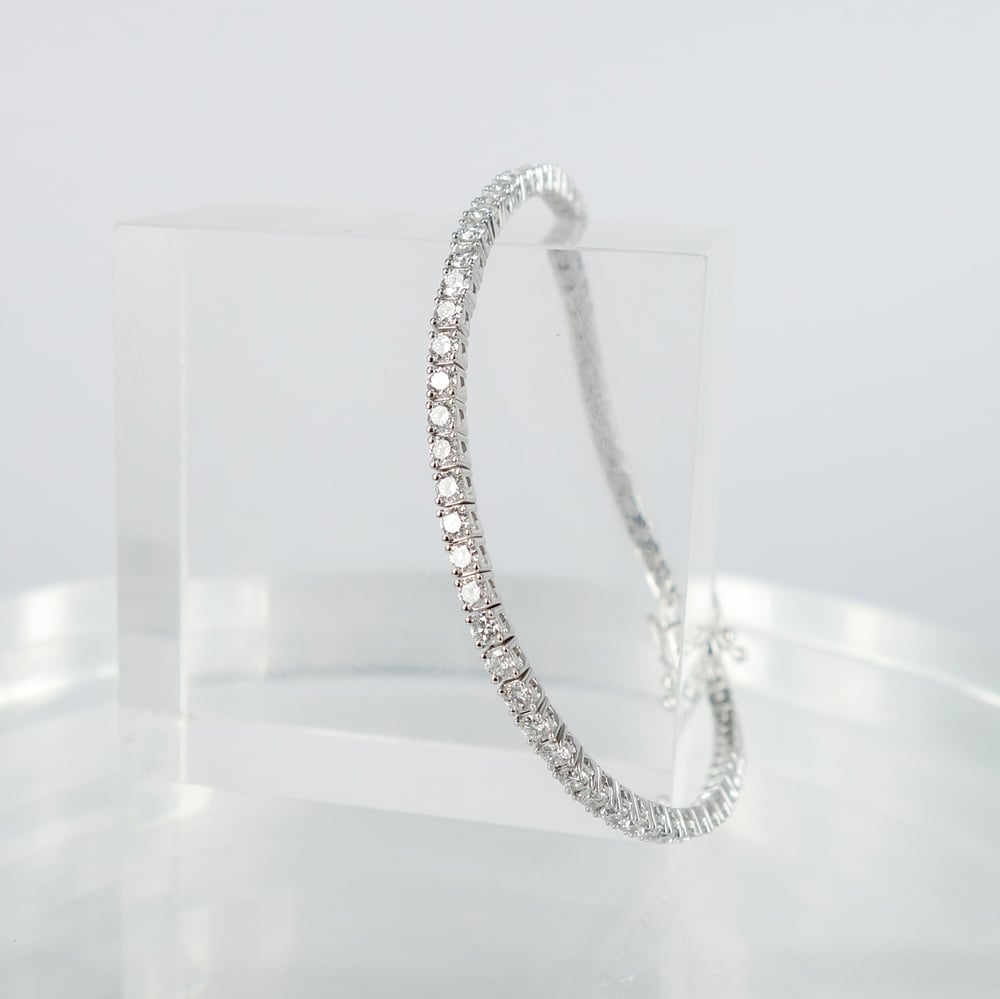 Image of 18ct white gold tennis bracelet set with .05pt D-E SI lab grown diamonds. TB1