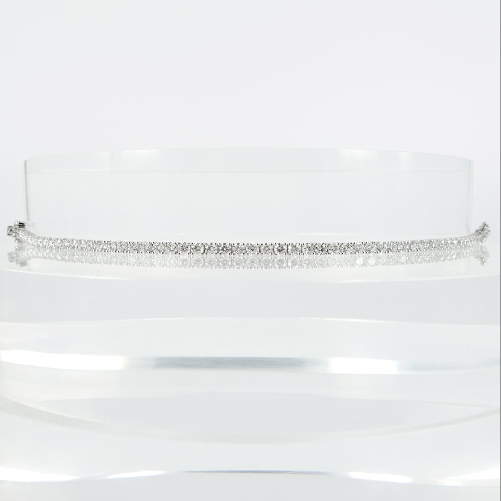 Image of 18ct white gold tennis bracelet set with .10pt D-E SI lab grown diamonds. TB2