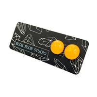Image 2 of Yellow and Clear Studs
