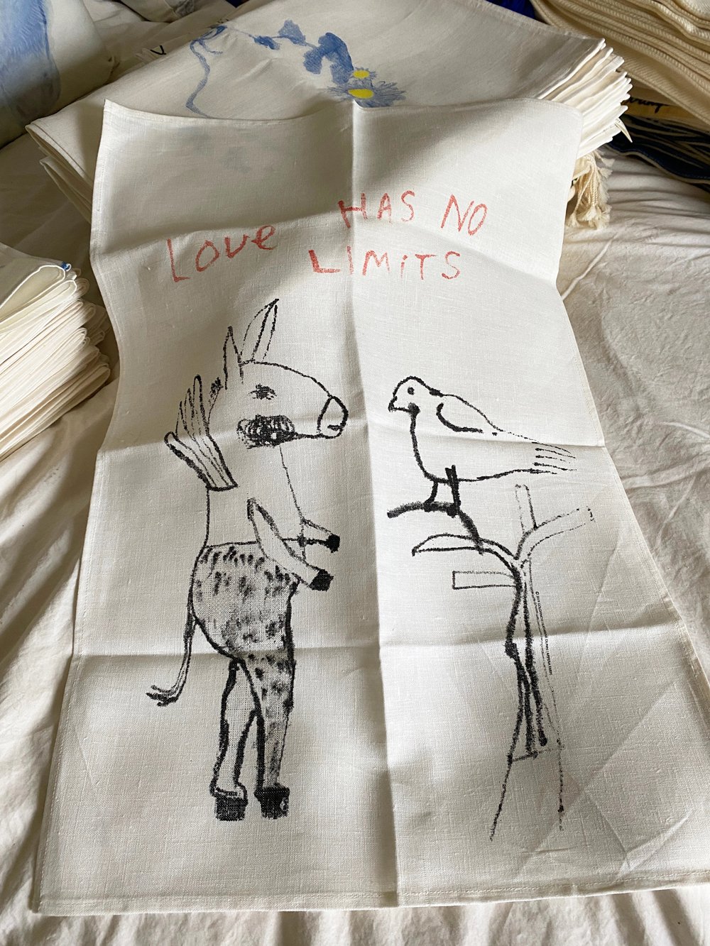 Image of "Love has No Limits" linen tea towel