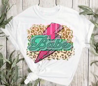 Turquoise Babe with pink bolt 