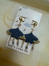 Moth dangles 
