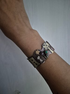 Copper bracelet with trees, houses, cat and star