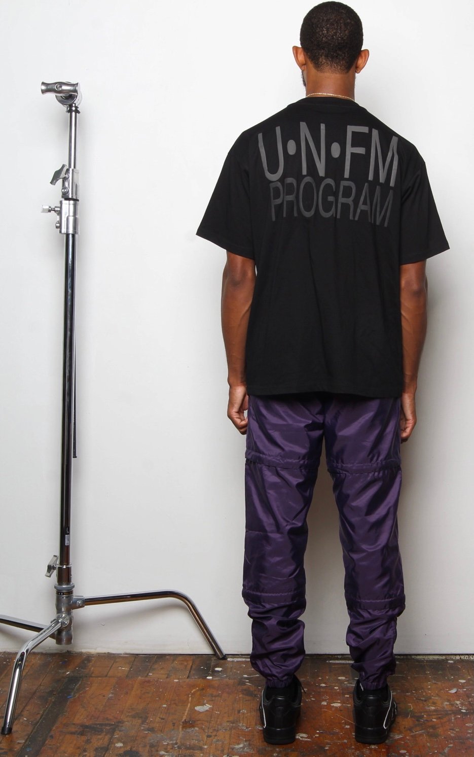 Image of Black “U•N•FM PROGRAM” T