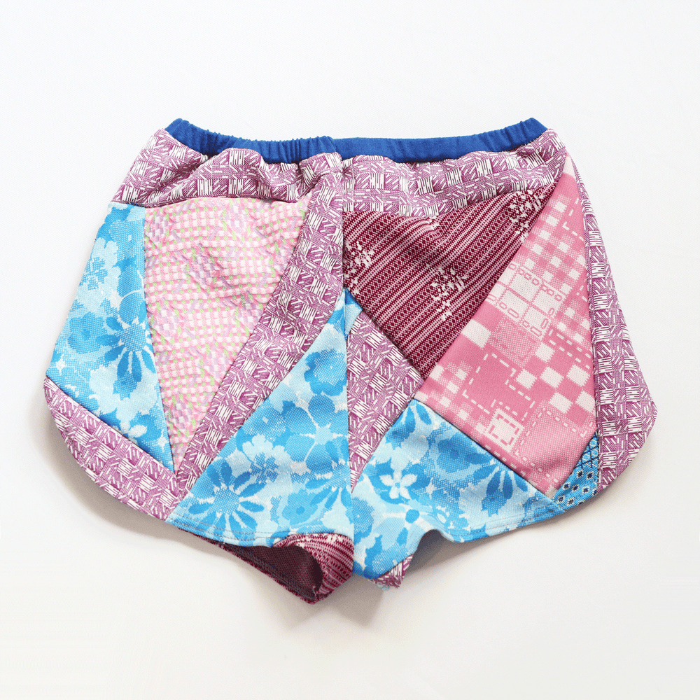 Image of blue rose purple vintage fabric poly 70s knit size 12 dolphin dolfin hem courtneycourtney shorts 