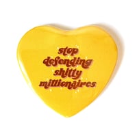 Image 1 of STOP DEFENDING MILLIONAIRES - Heart Shaped Button/ Magnet