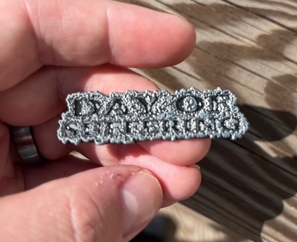 Day of Suffering logo enamel pin