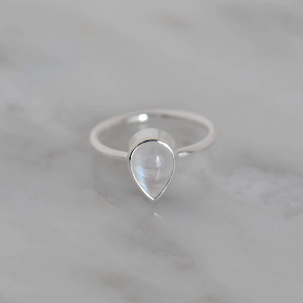 Image of Rainbow Moonstone pear shape cabochon cut classic silver ring