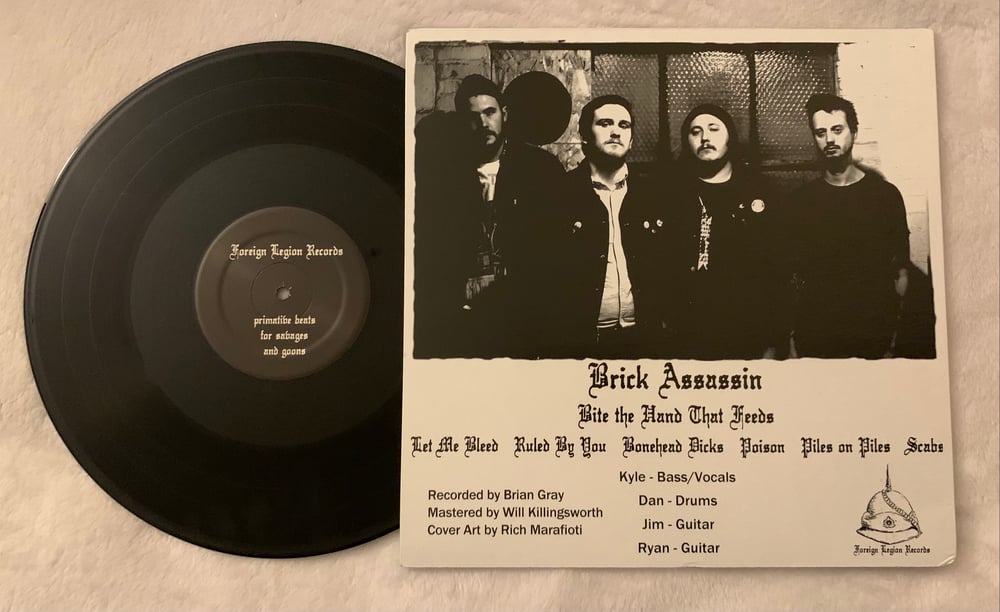 Brick Assassin- Bite The Hand That Feeds