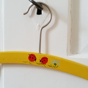 Image of Vintage Children's Hanger - yellow