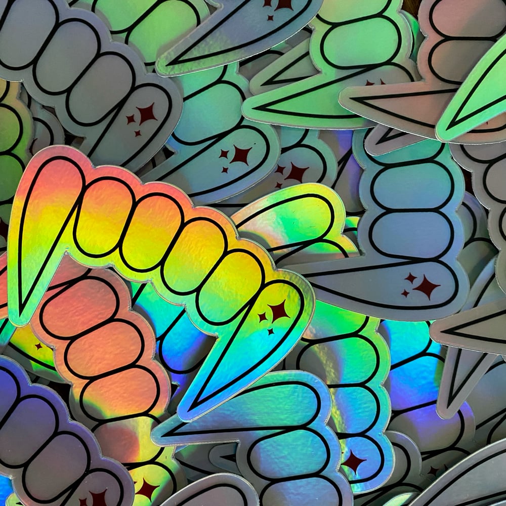 Image of holographic fang sticker