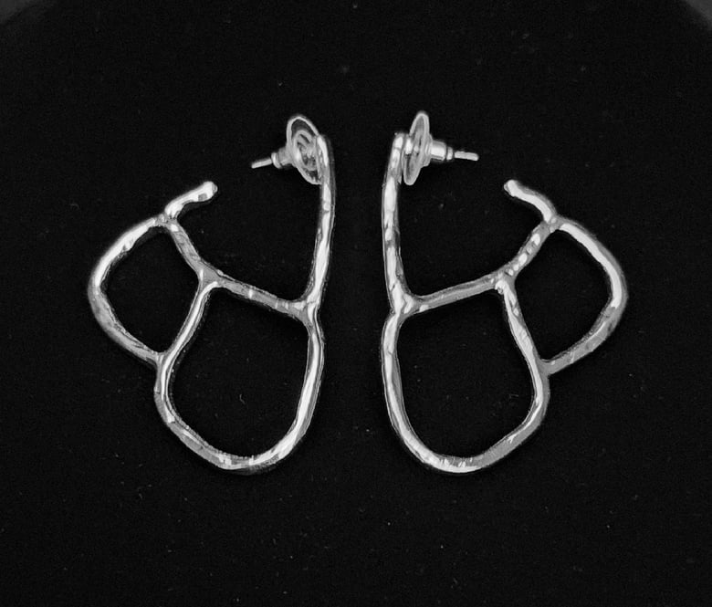 Image of Silver Beaten Abstract Pierced Earrings 