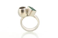 Image 1 of Emerald and citrine sculptural ring in sterling silver. Contemporary Jewellery by Chris Boland