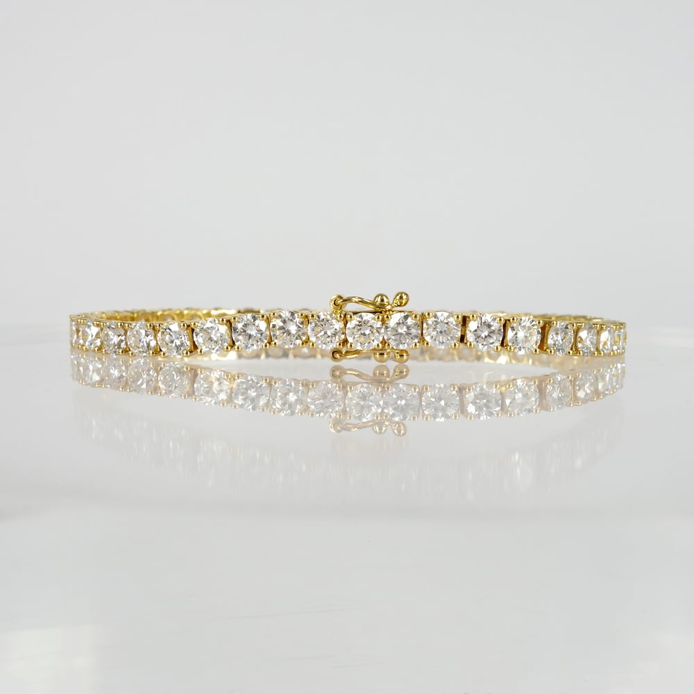 Image of 18ct yellow gold tennis bracelet set with .14pt E-F lab grown diamonds.. TB4
