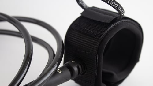 Image of large wave surf leash